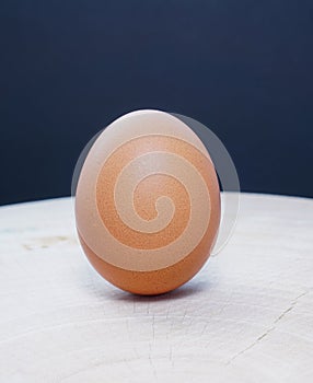 Organic eggs on a Chopping Wood