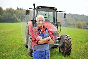 Farmer and his Red Tractor photo