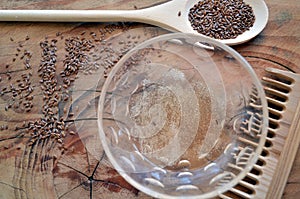 Natural styling for curly and wavy hair: flaxseed gel in glass bowl photo