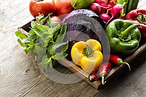 Organic food background Vegetables, Fresh vegetables basket on a wooden table