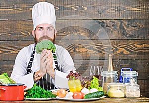 Organic food. Fresh ingredients only. Culinary recipe concept. Man bearded hipster cooking fresh vegetables. Freshest