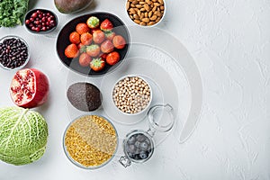 Organic food for healthy nutrition and superfoods, flat lay, on white background