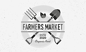 Farmers Market vintage logo. Organic food store logo with shovel and pitchfork. Vector illustration photo