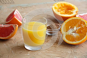 Organic foods orange, grapefruit, juice and aromatic cinnamon