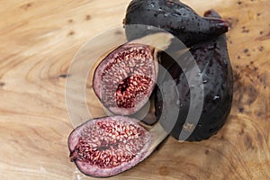 Organic fresh half cut purple sweet fig fruit