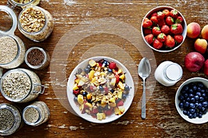Organic fresh nutritious breakfast muesli and seasonal fruits healthy lifestyle
