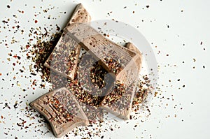 Organic fruit tea and chocolate on white table photo