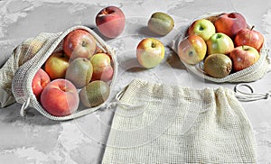 Organic fruits in reusable eco friendly natural bag photo