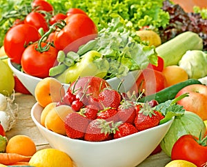 Organic fruits and vegetables in bowls