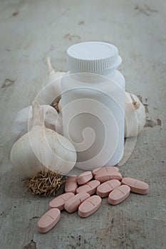 Organic garlic, boottle and herbal pills