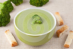 Organic green broccoli soup vegan recipe with