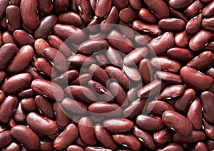 Organic healthy dry raw red bean seeds textured background.Macro