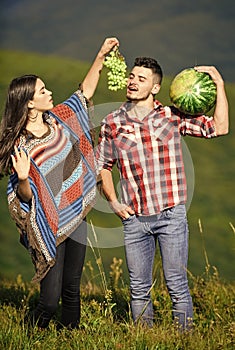 organic and healthy. hippie couple with fruits. vitamin and dieting. summer food. man and woman hold watermelon. girl