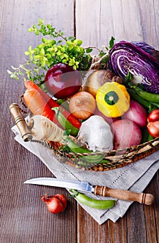 Organic healthy vegetables in the rustic basket