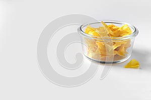 Organic jackfruit chips on paper background with copy space