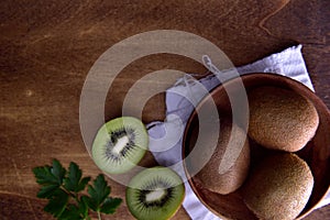 Organic Kiwi with a wooden background