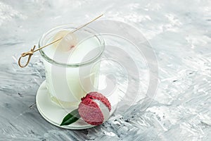 Organic leechee sweet fruit with litchy juice in glass. Restaurant menu, dieting, cookbook recipe top view photo