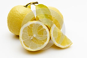Organic lemons on white background