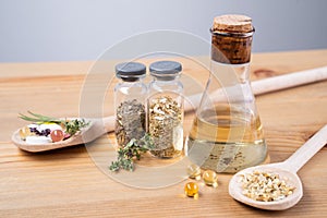 Organic medical pills with herbal plant on a white background. Ethnoscience concept.