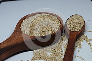 Organic natural Til Gul OR Sesame seeds over white background