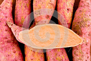 Organic orange sweet potato yam and half sweet potato on white background healthy fruit food