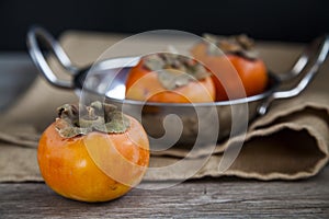 Organic persimmons photo