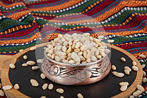 Organic pine nuts, bulk and fresh shelled pine nuts individually kernels. Cedar nuts and cones. Organic Healthy Food