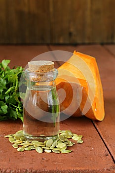Organic pumpkin oil in a glass jar