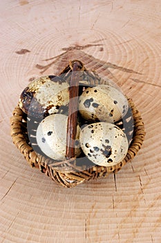 organic quail eggs in a basked