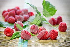 Organic raspberry on table - fresh vegetarian food