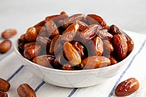 Organic Raw Date Fruit in a Bowl, side view. Close-up