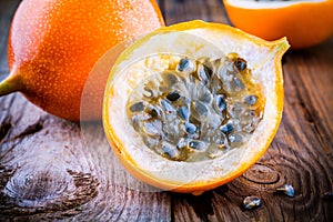 Organic raw ripe yellow granadilla passion fruit