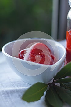 Organic red peppers in ceramic pot