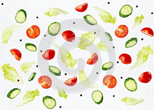 Organic salad ingredients - cherry tomato, cucumber, green salad flying and falling on white wall. Vegetables seamless pattern.