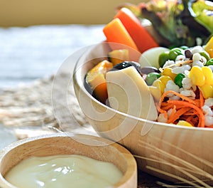 Organic salad vegatable on wooden bowl