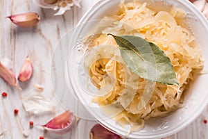 Organic sauerkraut pickled cabbage with onions, garlic and spices