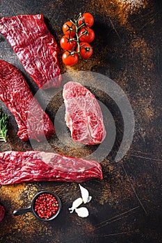 Organic set of raw alternative beef steaks flap flank Steak, machete steak or skirt cut, Top blade or flat iron beef and tri tip,