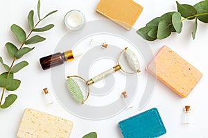 Organic skin care  products and  face roller on white background. Copy space. Apothecary