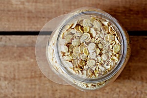 Organic soy flakes in jar photo