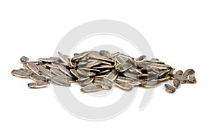 Organic Sunflower black seeds isolated on white background.