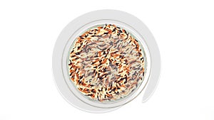 Organic three colors (red, black, and brown) parboiled rice on a white background