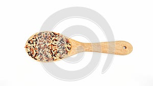 Organic three colors (red, black, and brown) parboiled rice on a white background