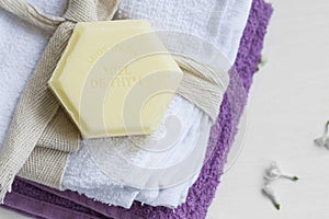 Organic thyme honey soap on cotton towels, beauty spa