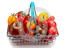 Organic tomatoes in a basket from the supermarket