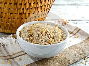 Organic Uncooked Healthy Brown Rice In Bowl