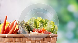 Organic vegetables in box on table and blur background, Healthy food concept.