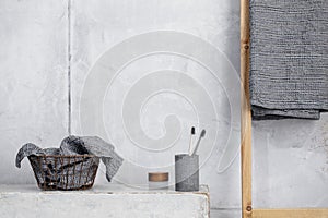 Organic waffle linen towels, bamboo toothbrushes, bathroom zero waste accessories in grey shades