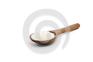 Organic white rice or jasmine rice in a wooden spoon isolated on a white background