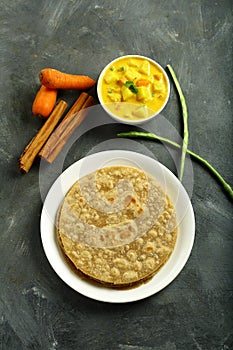 Organic Whole wheat chapathi served with curry