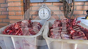 Organic wild venison from a deer in white box. Raw deer red meet. Butchering and Processing Wild Game Deer Meat.